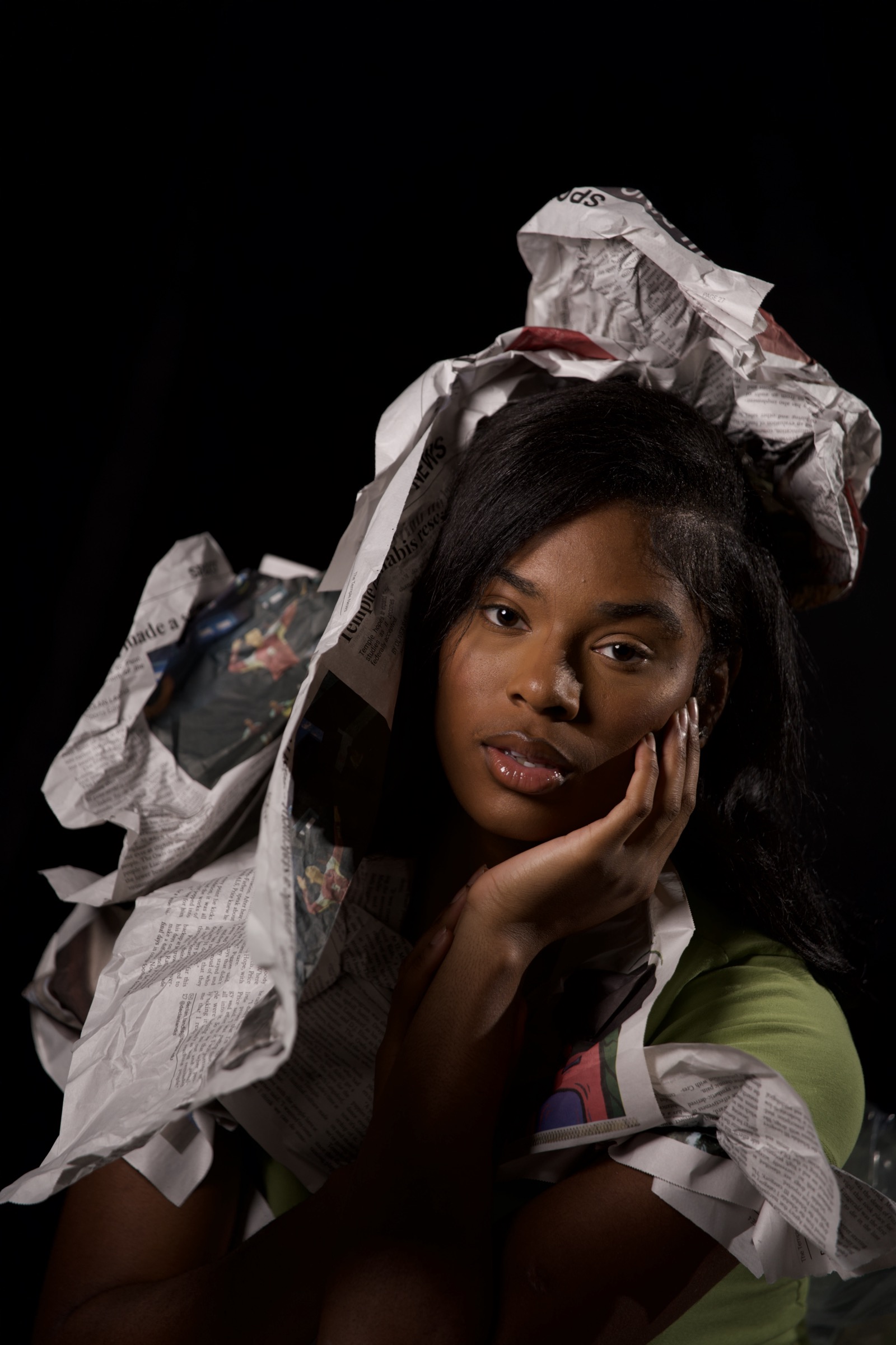 Newspaper concept portrait by Tyquin Briggs